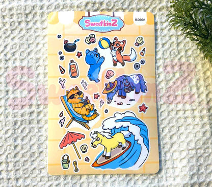 Sheet of colorful animal and beach objects stickers on a textured surface with 'SweetkinZ' branding.