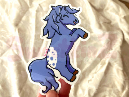 Purple cartoon horse sticker on a textured beige background